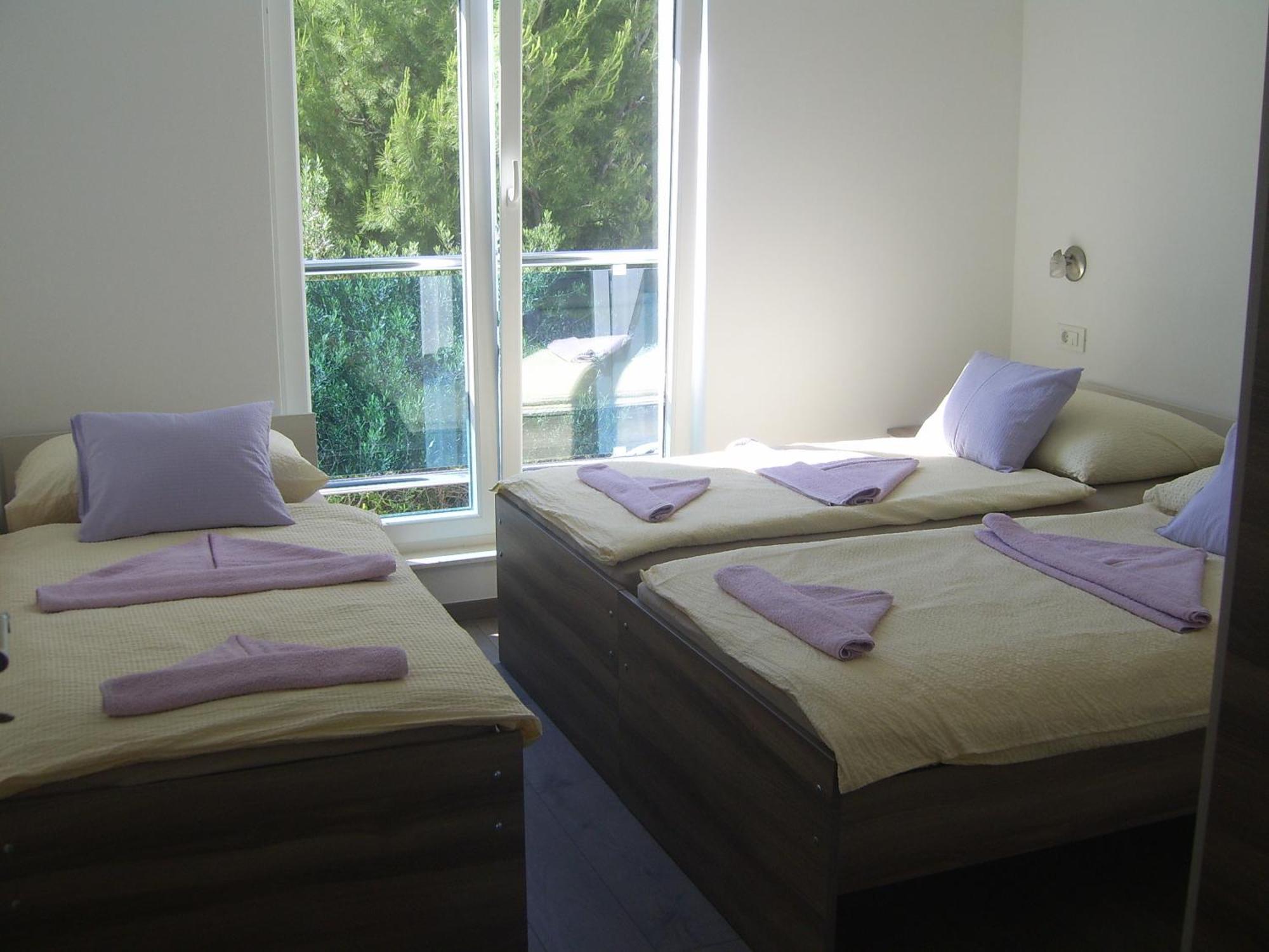 Apartments Villa Erik Rogoznica  Rom bilde